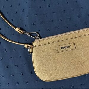 DKNY gold wristlet purse